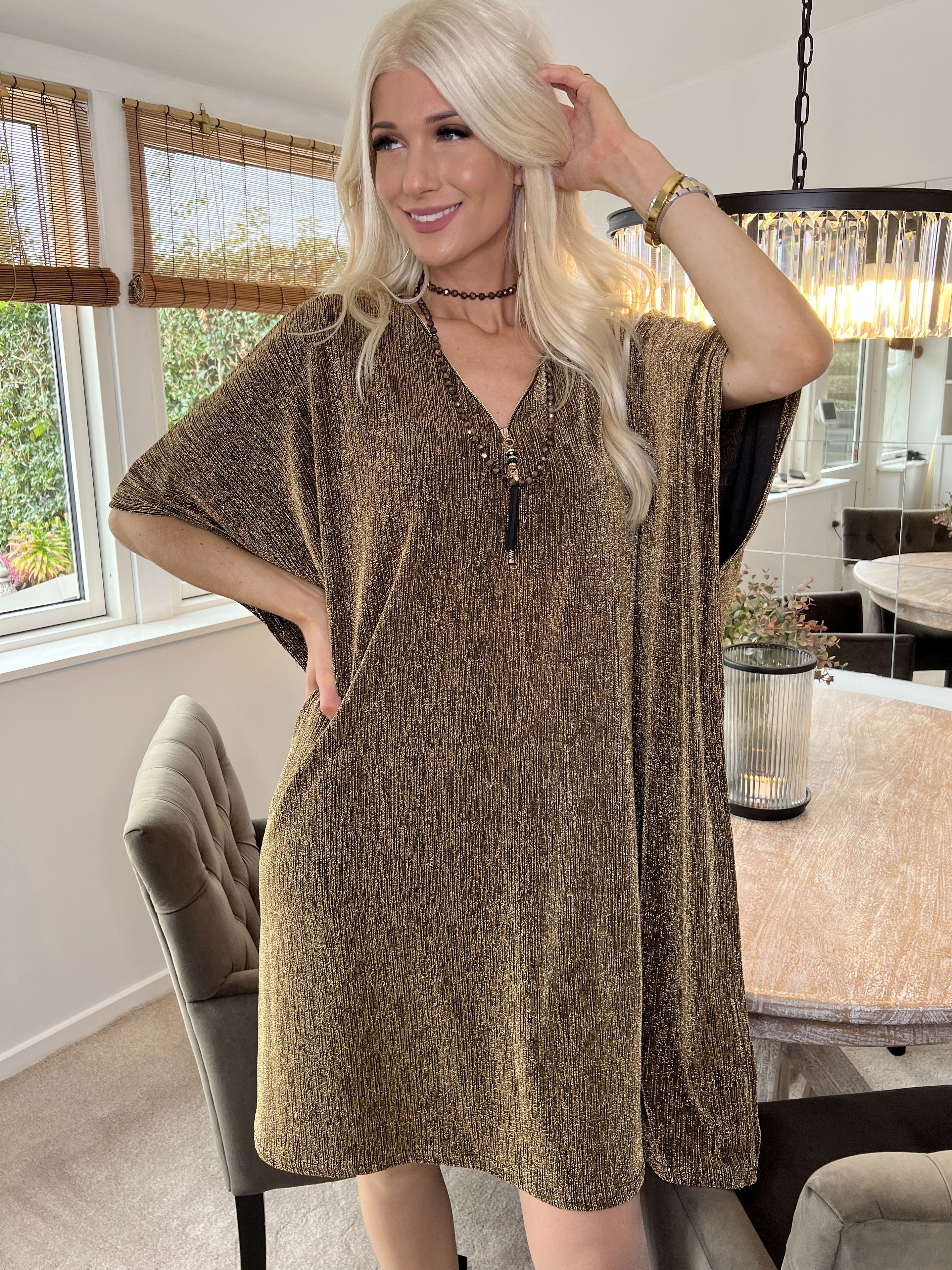 Mayte - Fin glitterklänning med blixtlås